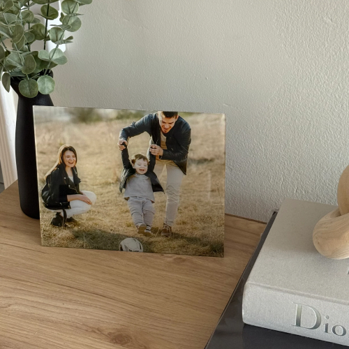 Glass print family on table