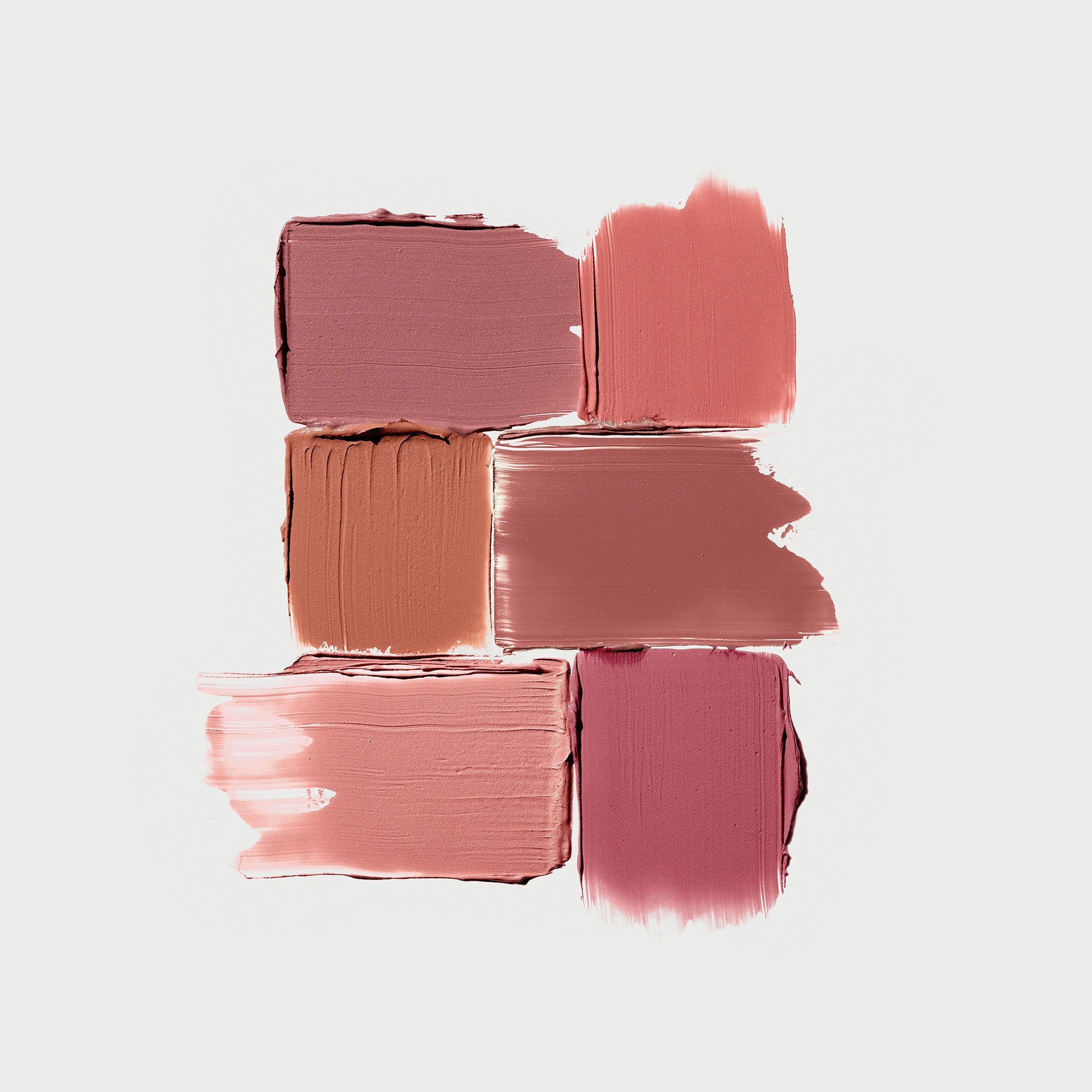 Amostra de produto dos 6 novos tons de blush em creme sobre um fundo cinza.