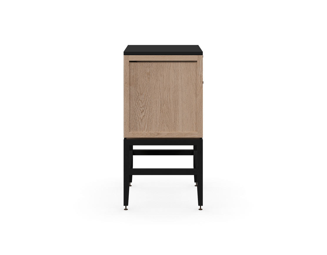 Coquo modular bathroom vanity with fix front and two doors in natural oak and black stained oak with metal handles.