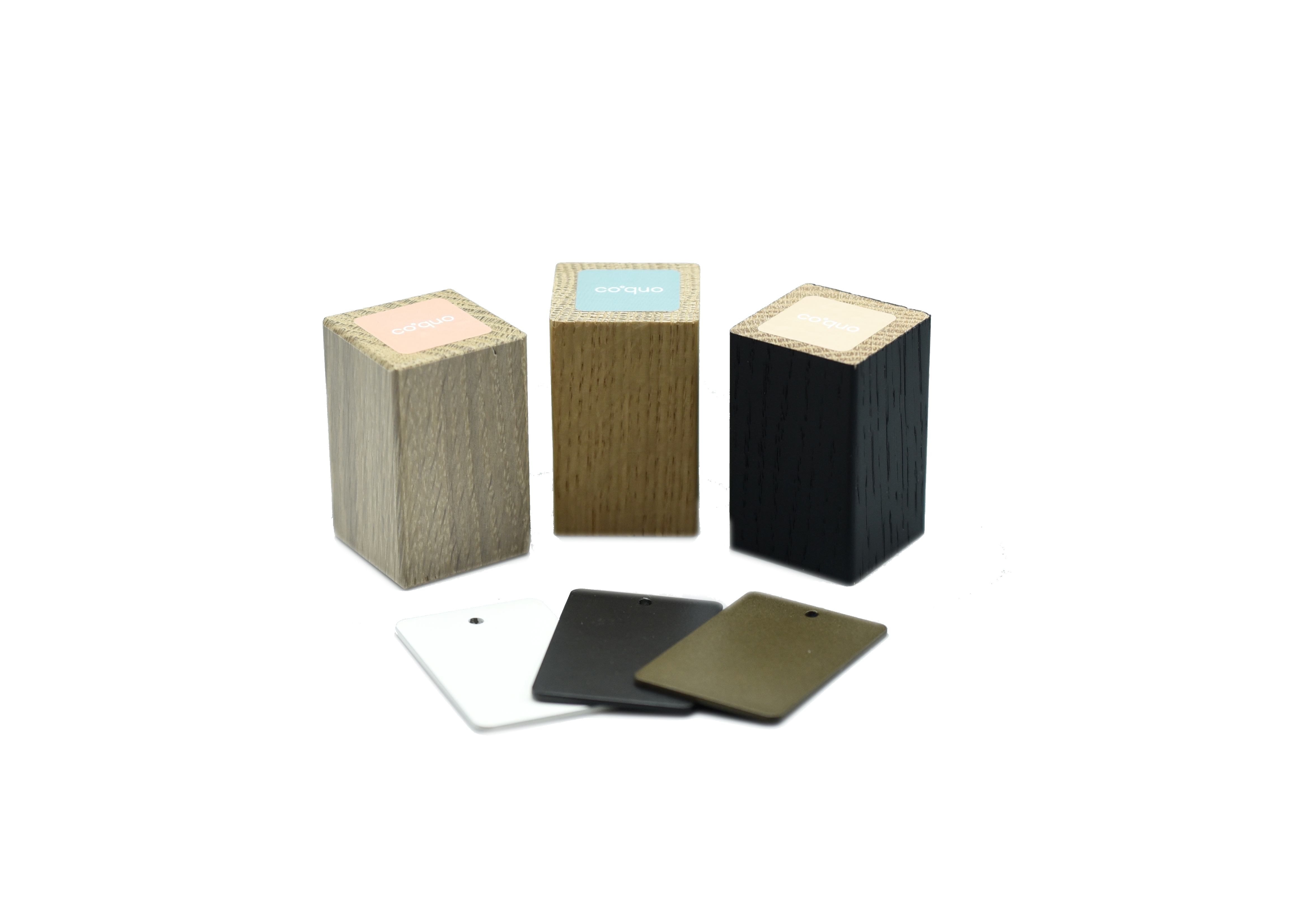 coquo sample kit that contains white stained oak, natural oak, black stained oak, white metal, black metal and bronze metal samples. 