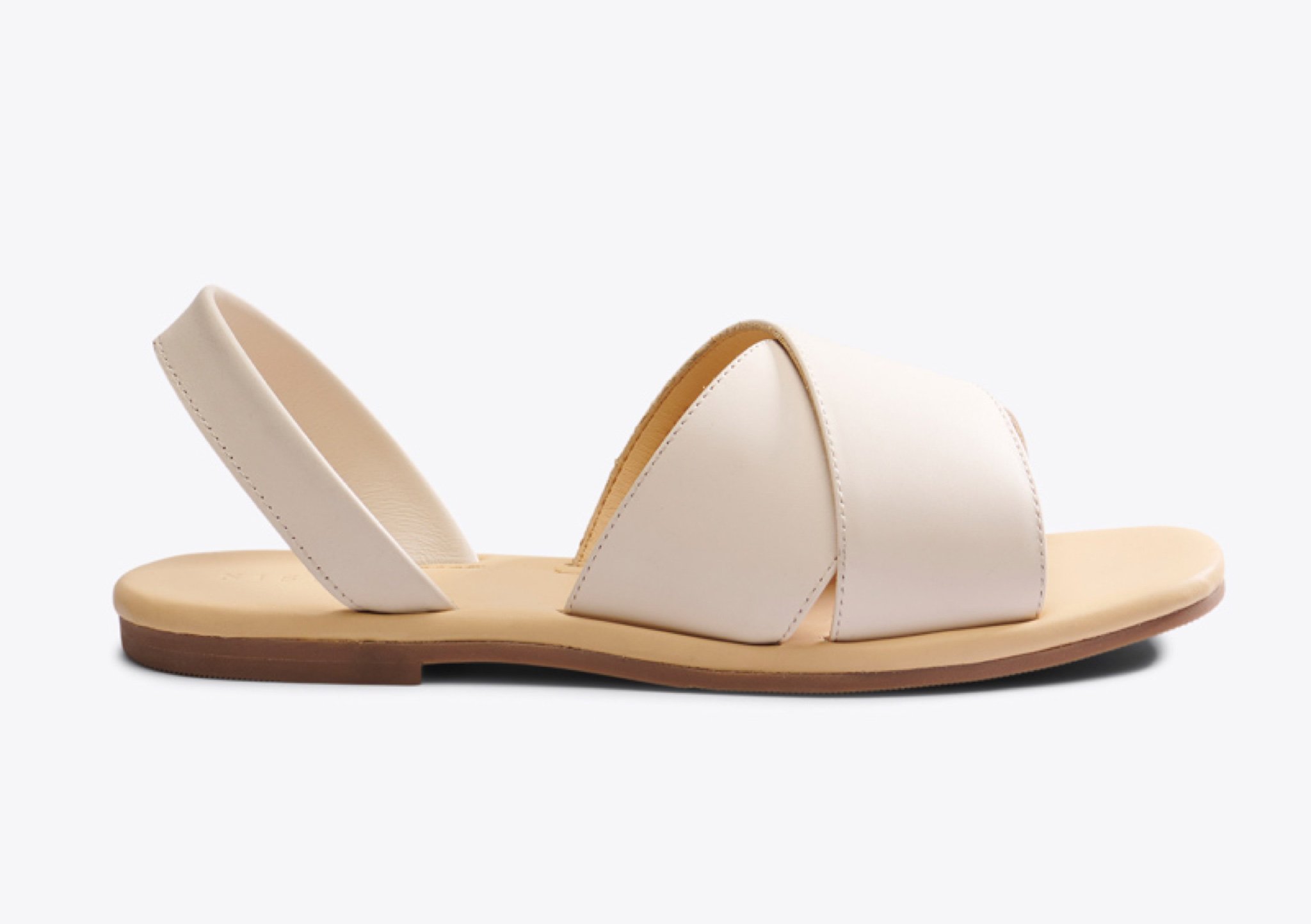 Nisolo All-Day Cross Strap Sandal Bone - Every Nisolo product is built on the foundation of comfort, function, and design. 