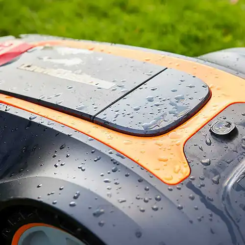 Rain drops on LawnMaster L12 robot mower sensors, sending it back to its charging station