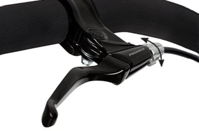hand operated active brake for slowing down, with a tension adjustor for control