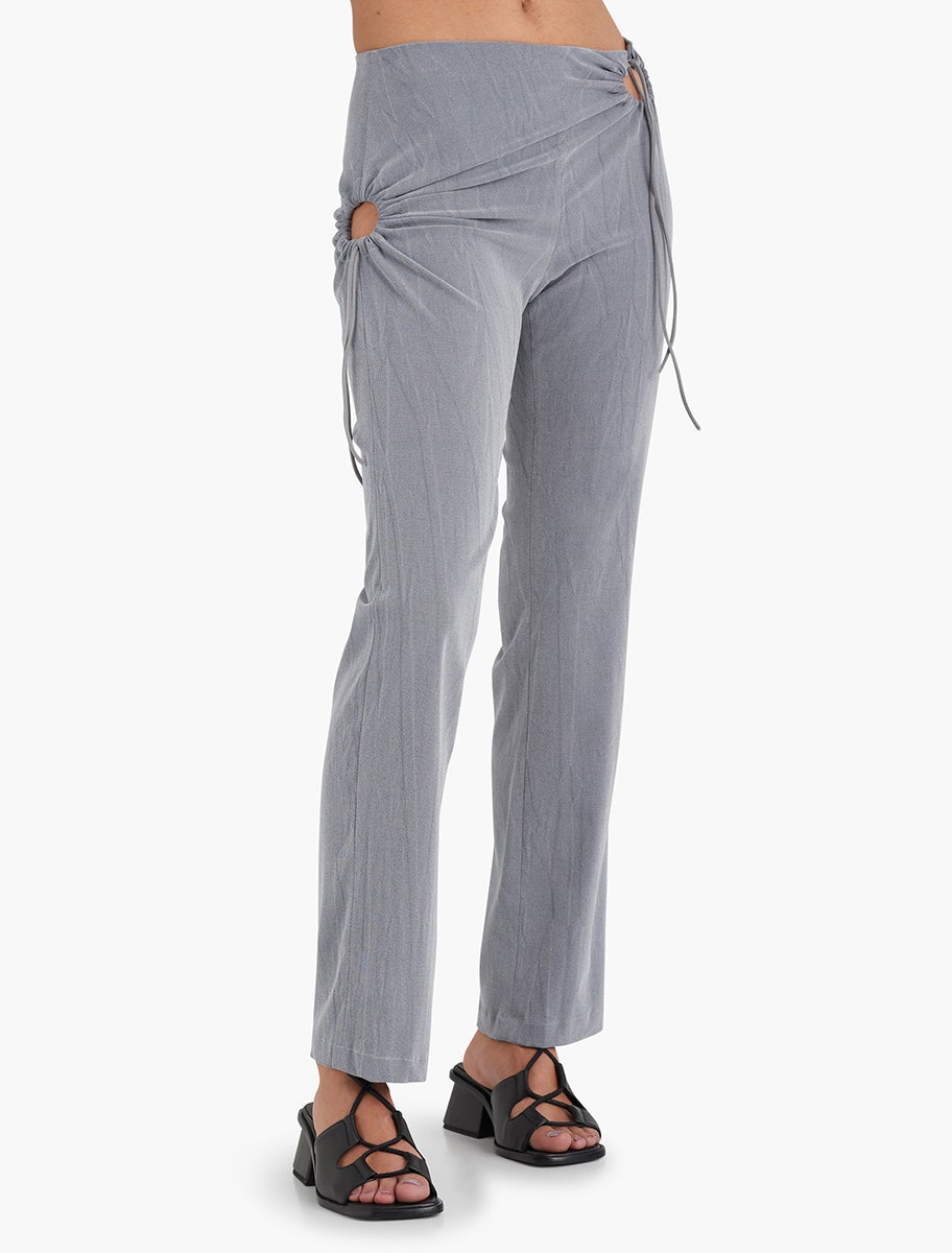 LOUP- Pants with asymmetric circular cuts