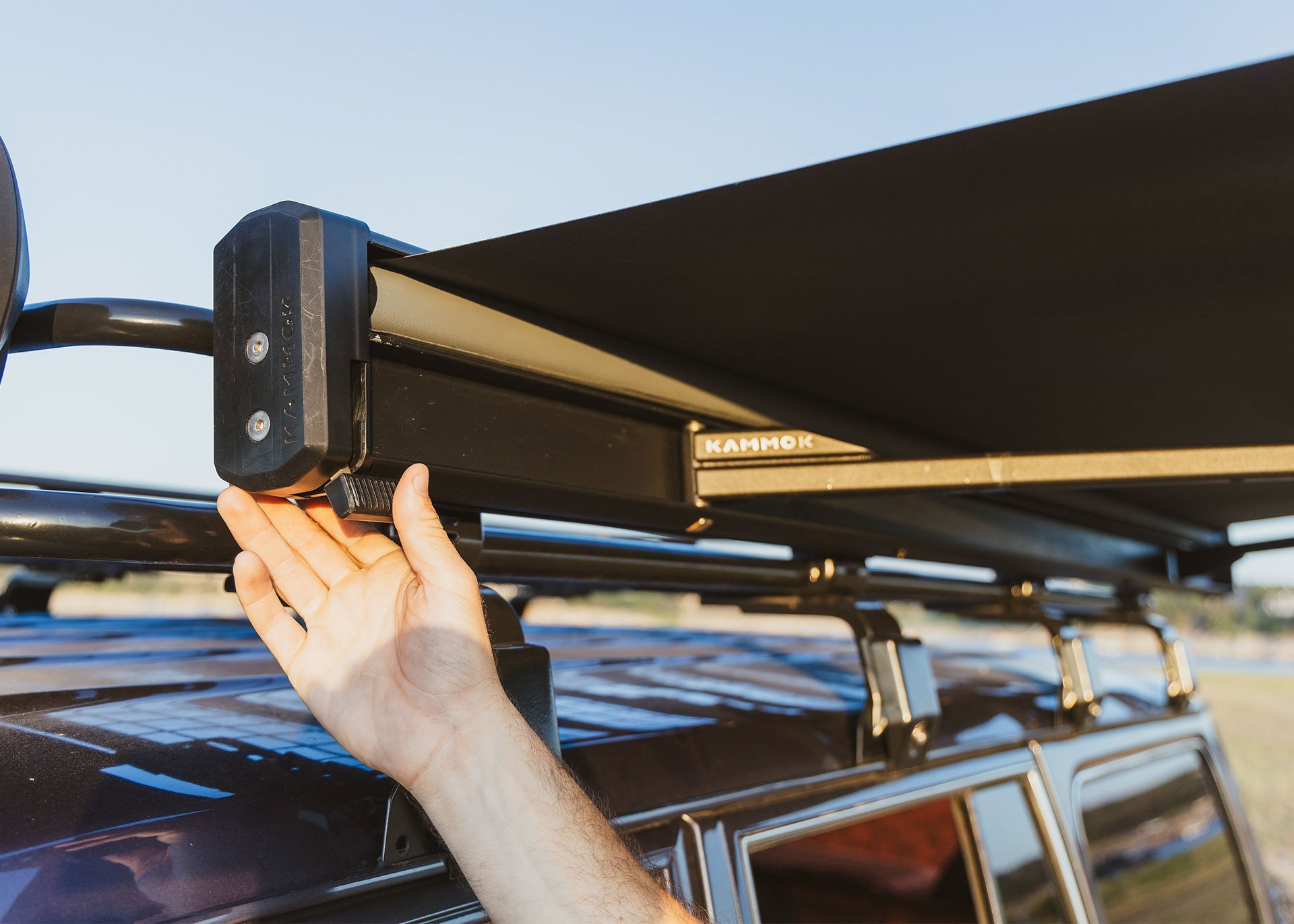 Closeup of man ratcheting the Pronto Latch.