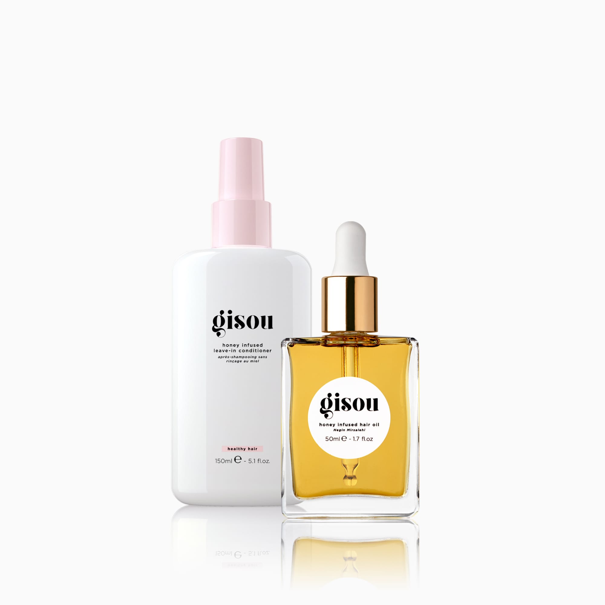 Combo set of the Honey Infused Hair Oil and Leave-In Conditioner next to each other