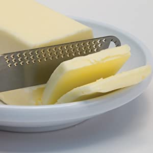 Slice pats of butter directly through the paper wrapping