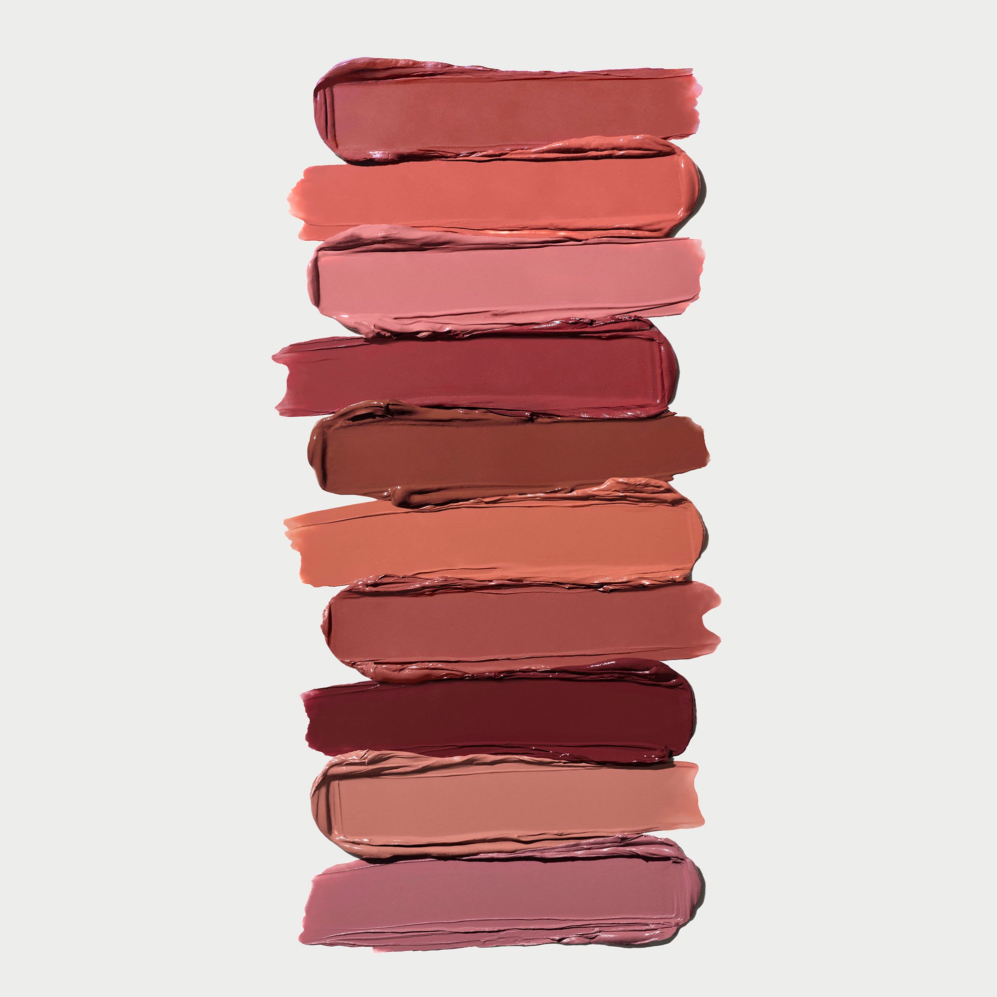 Image of product texture swatches in all 10 shades of the Satin Lip Color Rich Refillable Lipstick