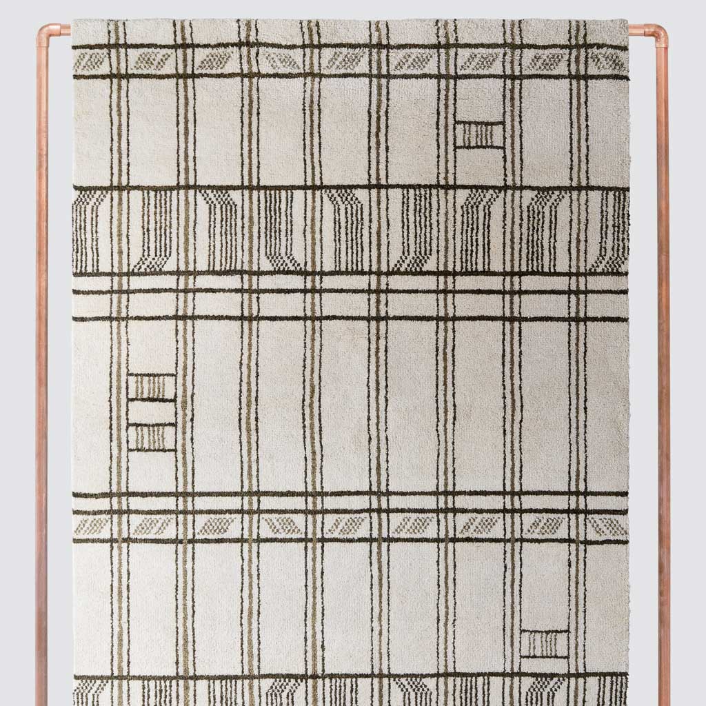 Geometric pattern on Tiya handwoven rug, olive