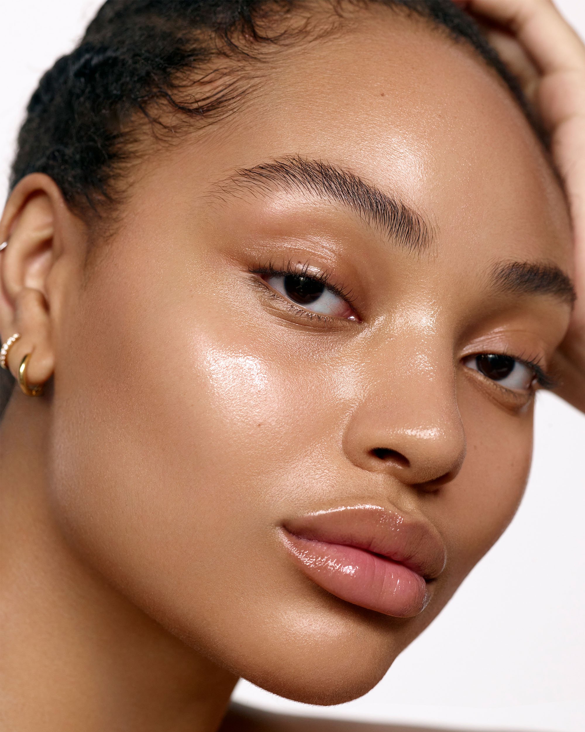 Image of model with a fresh face wearing Solar Power Luminous SPF 30 Serum