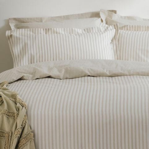 A beige and white duvet cover set with a mélange stripe design.
