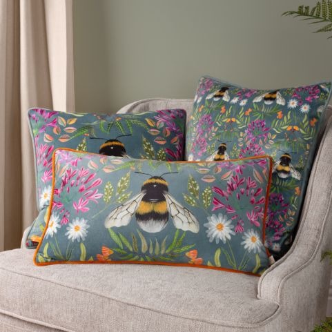 three bee cushions in cottagecore style