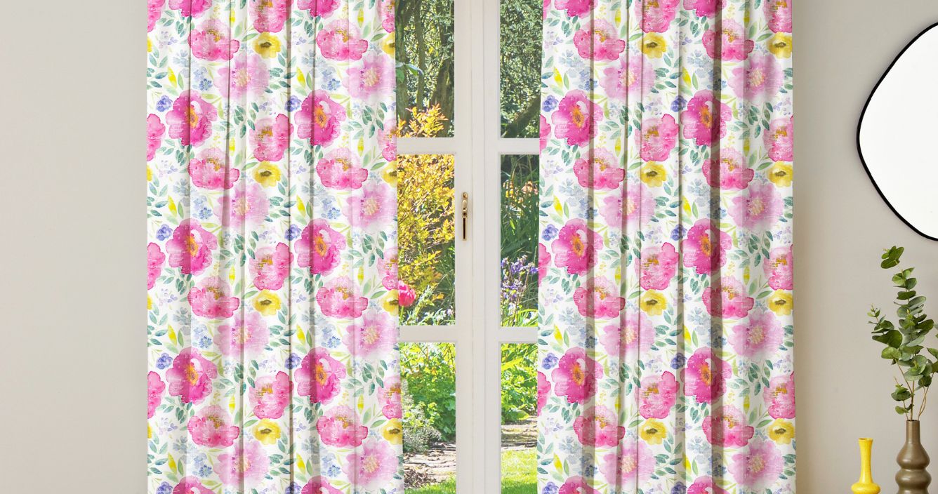peony floral curtains next to mirror and plant