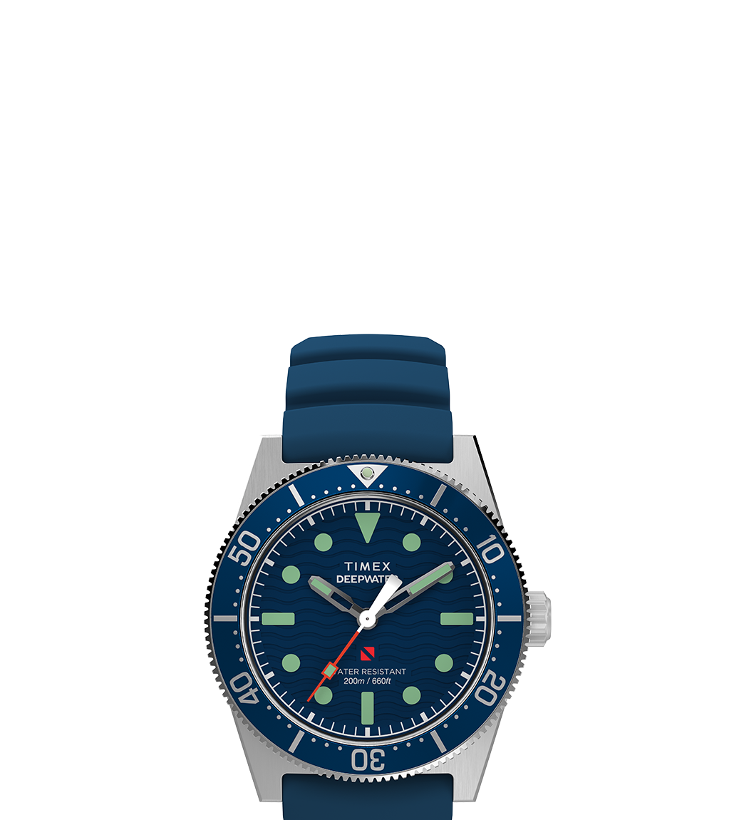 The Timex Deepwater Reef 200 watch isolated on a white background, shown with a deep blue silicone strap. The stainless steel case and ocean-inspired dial design emphasize its rugged, sport-diver aesthetic.