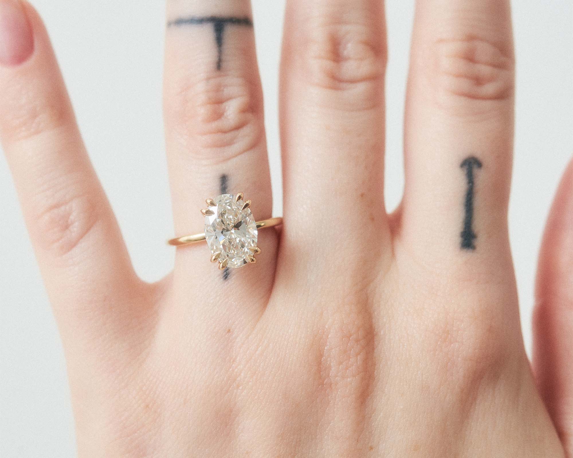 The Double Claw Solitaire Oval Diamond Engagement Ring | Holden