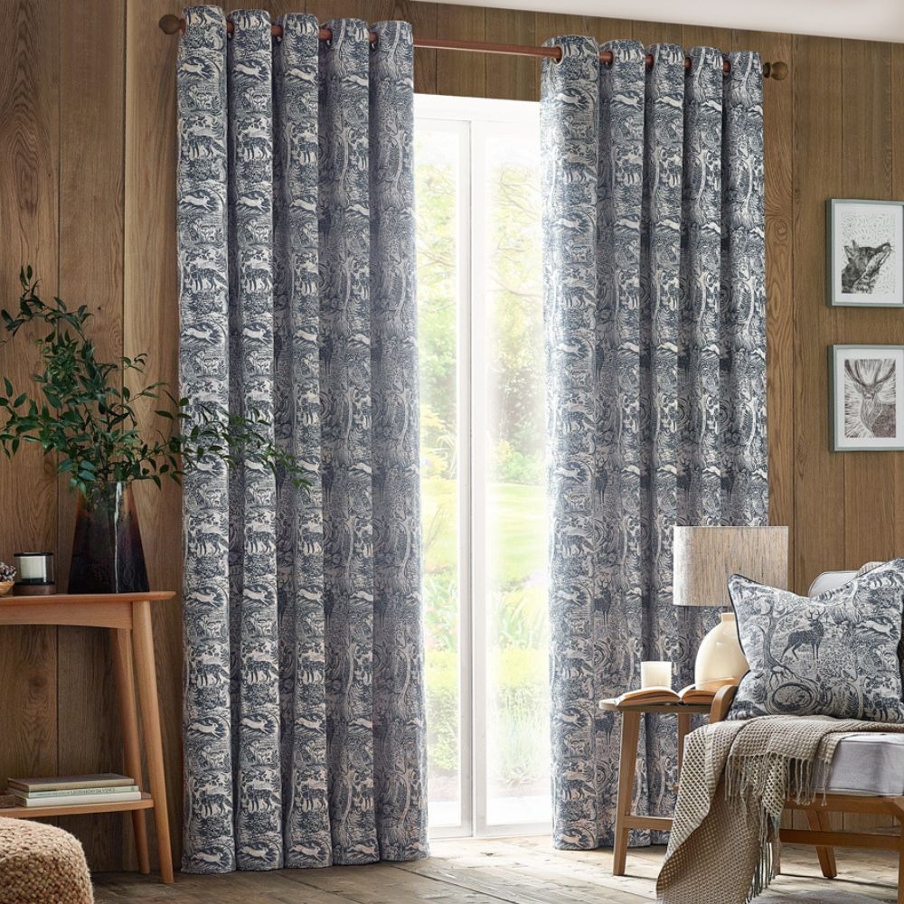 Navy curtains featuring a woodland pattern