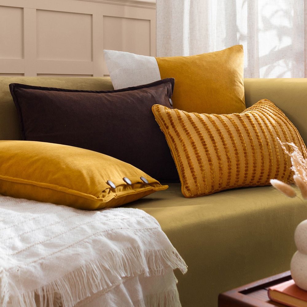 Yellow sofa with yellow cushions 