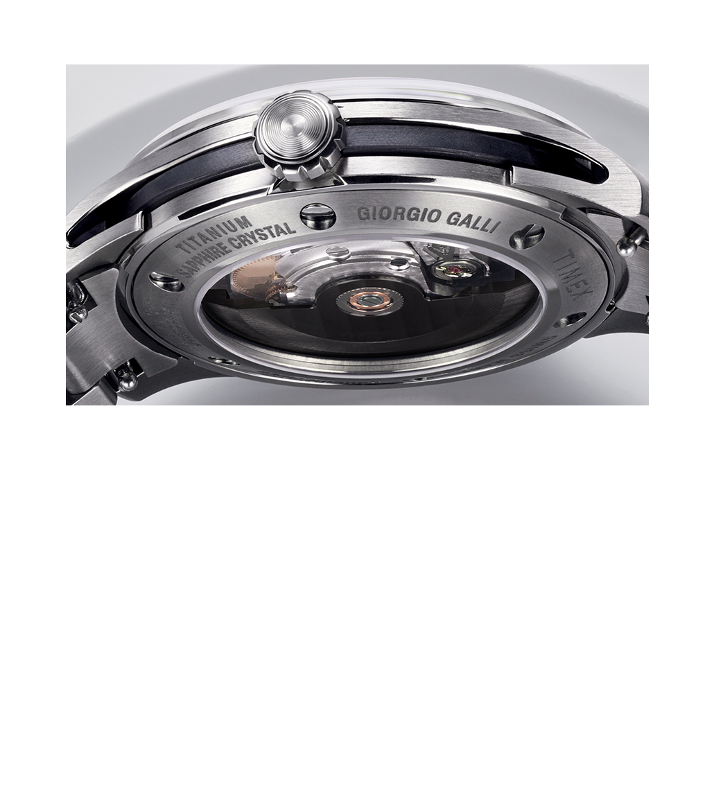 A view of the watch’s titanium case back, featuring engraved branding,