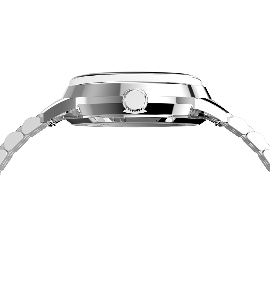 A close-up of the watch’s case, emphasizing its polished stainless steel finish, smooth bezel, and slightly domed crystal.