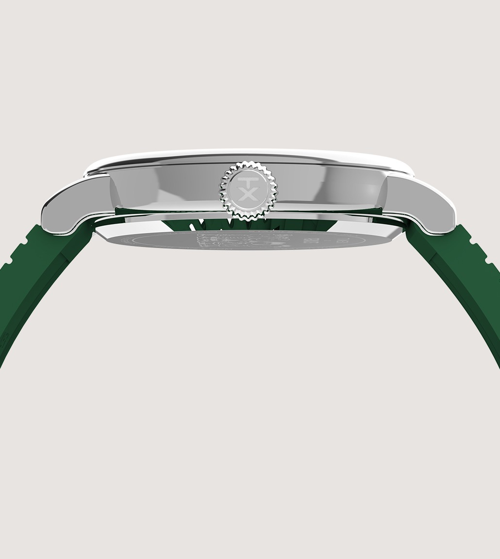 A close-up showing the slim stainless steel case, curved lugs, and a ridged crown with the Timex “T” logo.