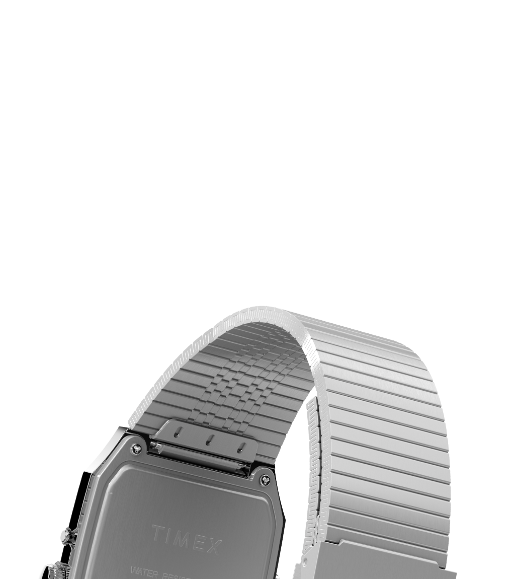 A rear view of the Q Timex® 1982 Ana-Digi Reissue watch, focusing on the case back and flexible stainless steel bracelet. The case back is engraved with the Timex logo, and the image highlights the watch’s durable construction.