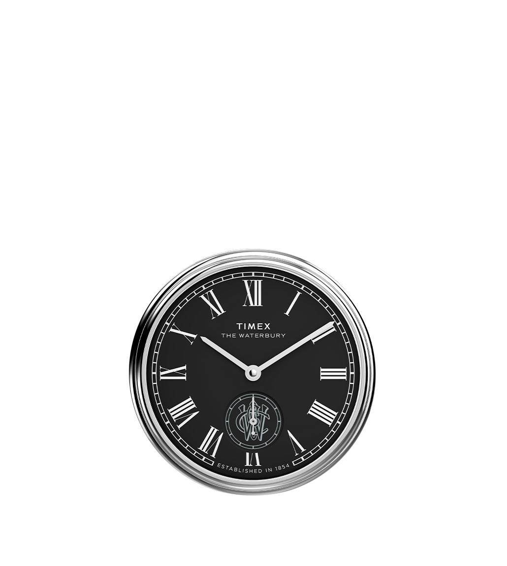 A detailed close-up of the Timex Waterbury Metropolitan Sub-Second watch face, highlighting the elegant black dial, silver-tone Roman numerals, and precise watch hands.