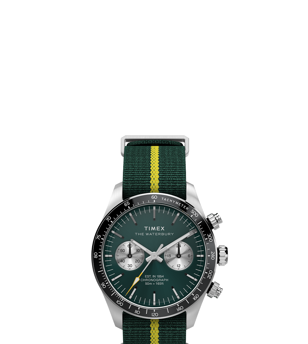 Front product image of the Timex Waterbury Heritage Chronograph with a forest green dial, polished hour markers, silver-tone sub-dials, black bezel with tachymeter markings, and a dark green nylon strap with a yellow center stripe.