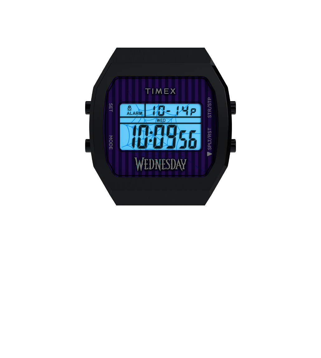 Close-up of the Timex x Wednesday T80 digital watch with its Indiglo backlight activated, illuminating the screen in blue while maintaining visibility of the purple striped background and “WEDNESDAY” branding.