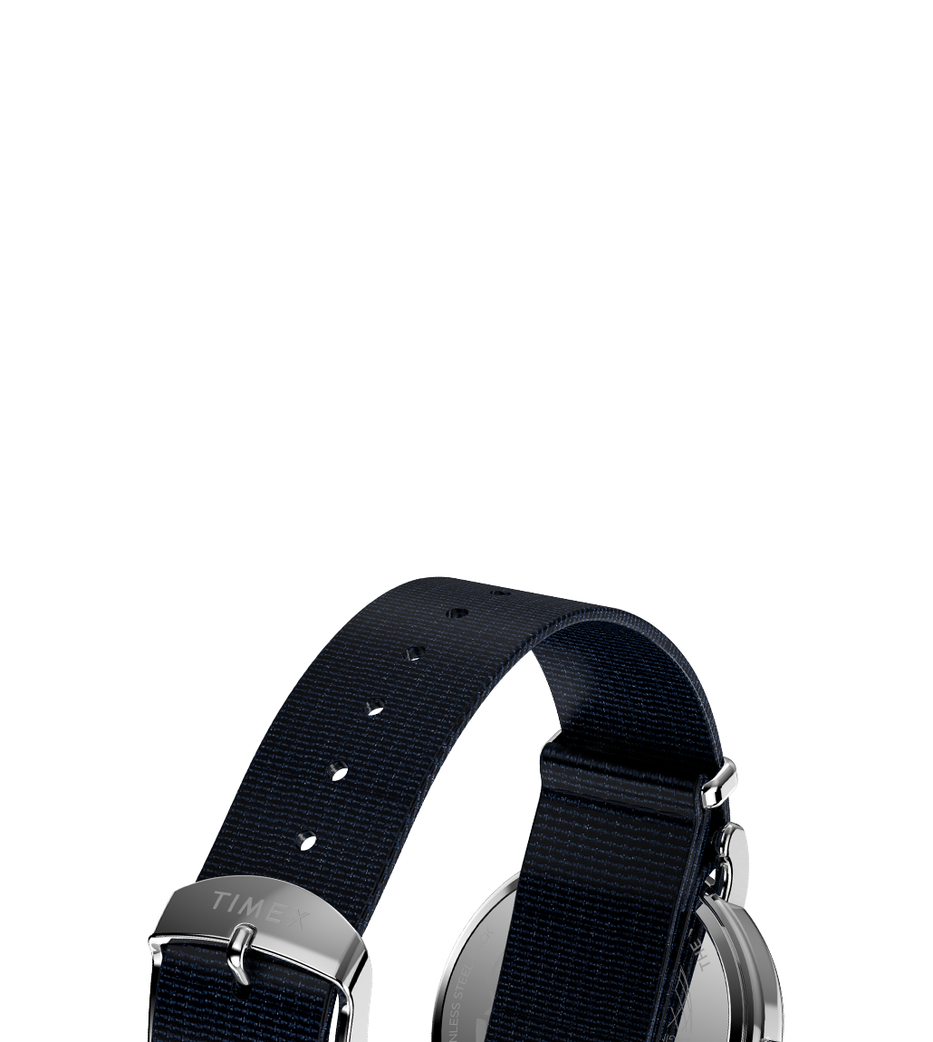 Detailed rear view of the Timex Weekender 37mm showing the navy-blue fabric strap, stainless steel hardware, and engraved Timex branding on the clasp.