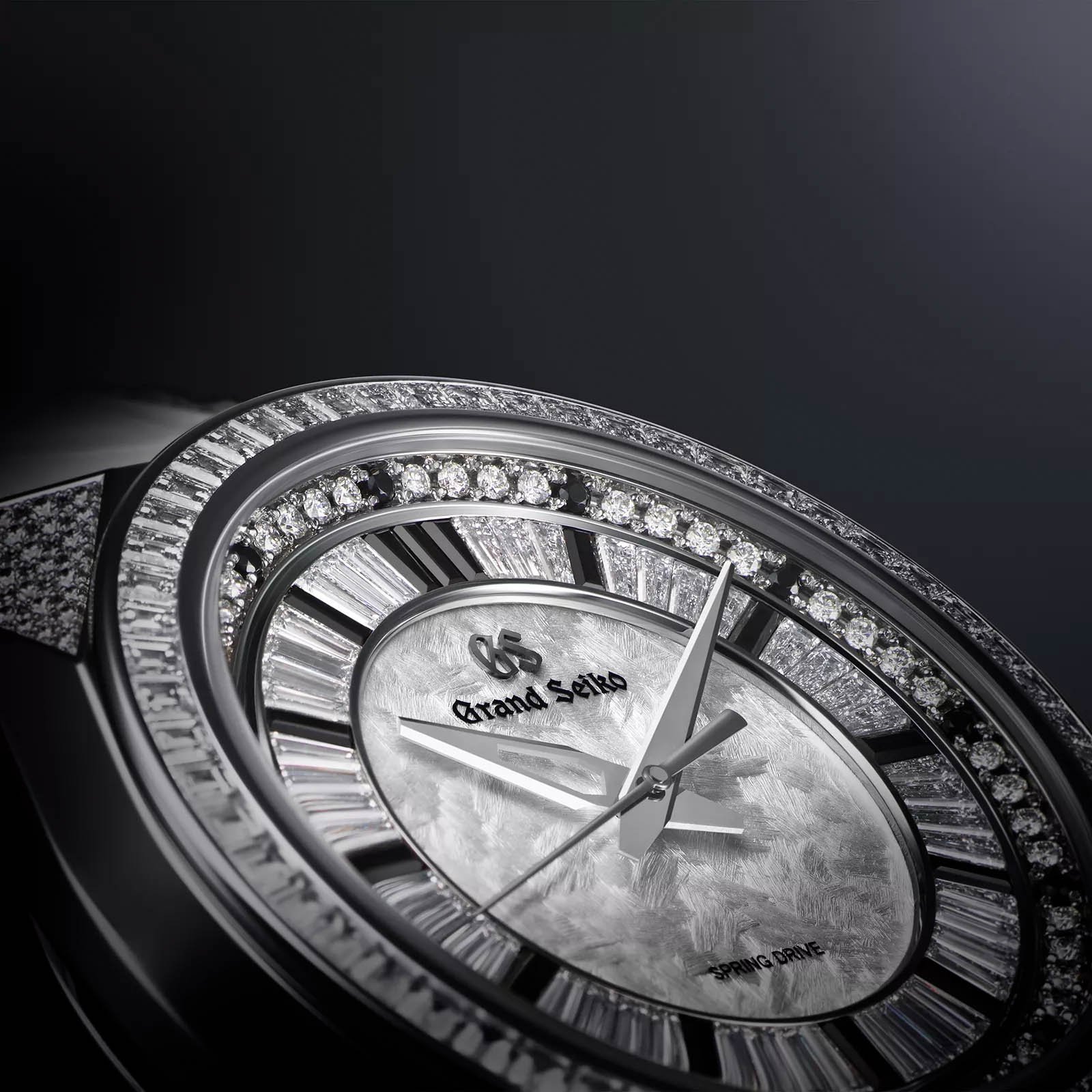 Dial and case details (diamonds and spinels) of SBGD209 watch. 