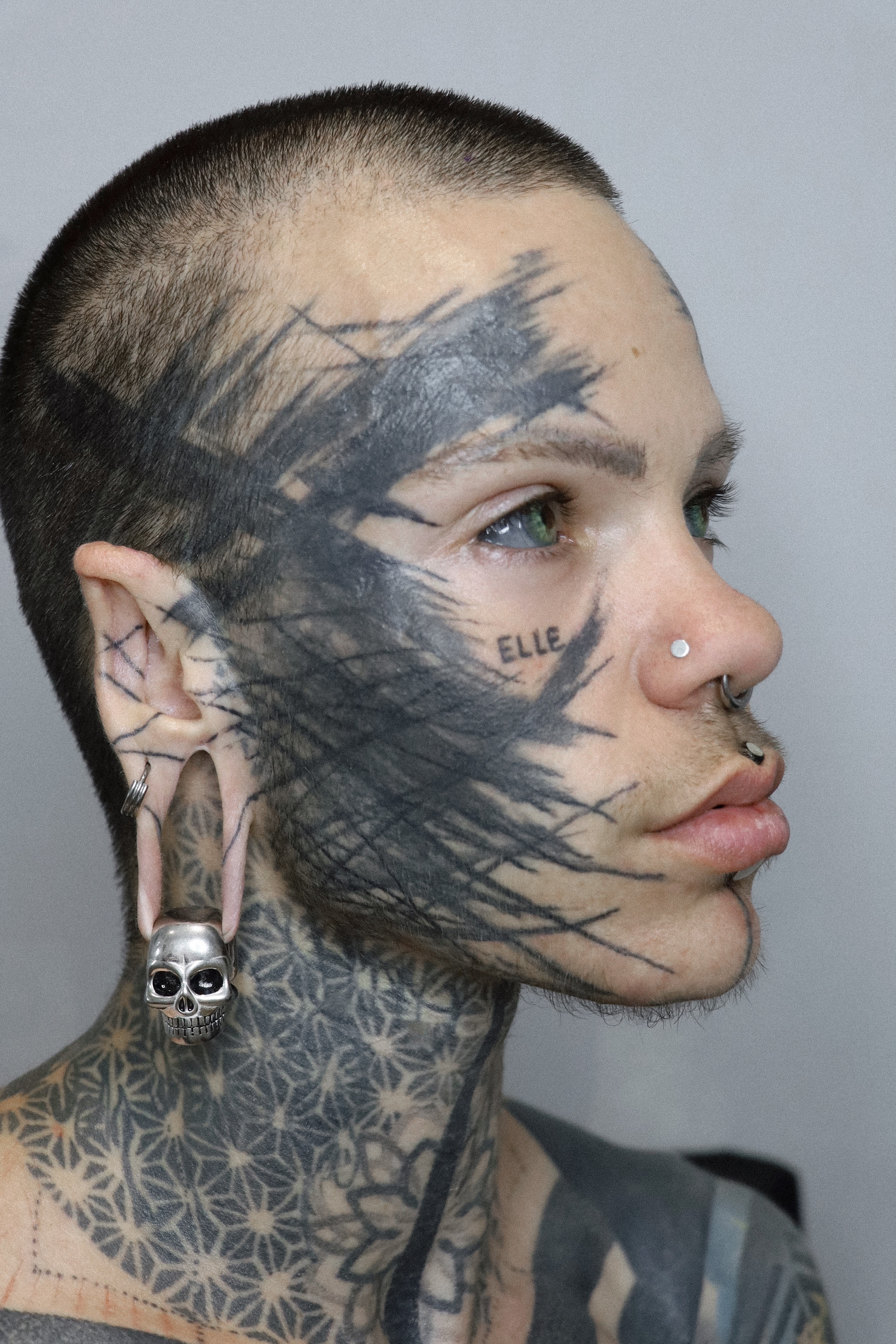 Guy wearing cool Silver Skull Ear Weights (Pair)