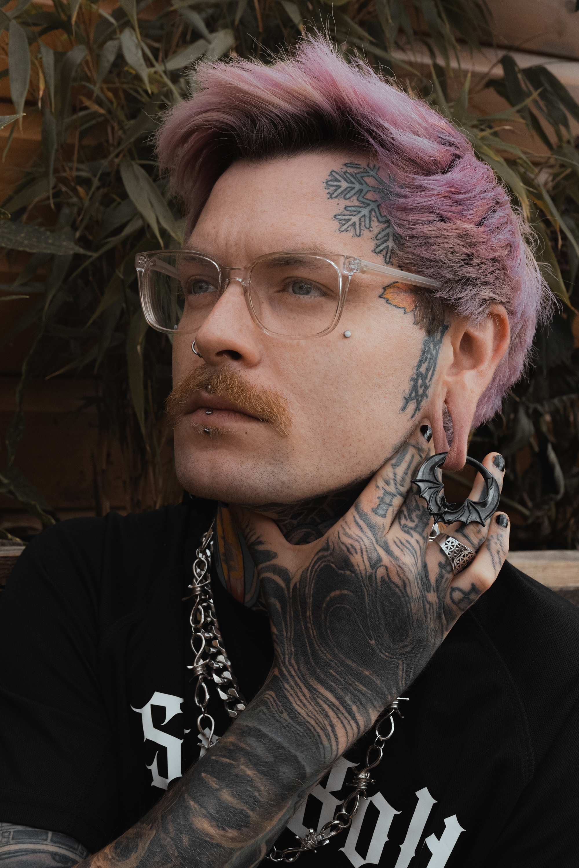 Male wearing large  Black Bat Ear Weights (Pair)
