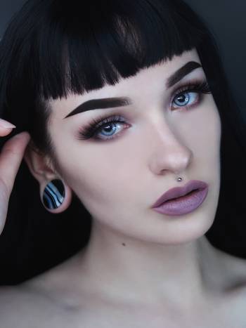 Women wearing large Black Line Agate Stone Plug / Gauge