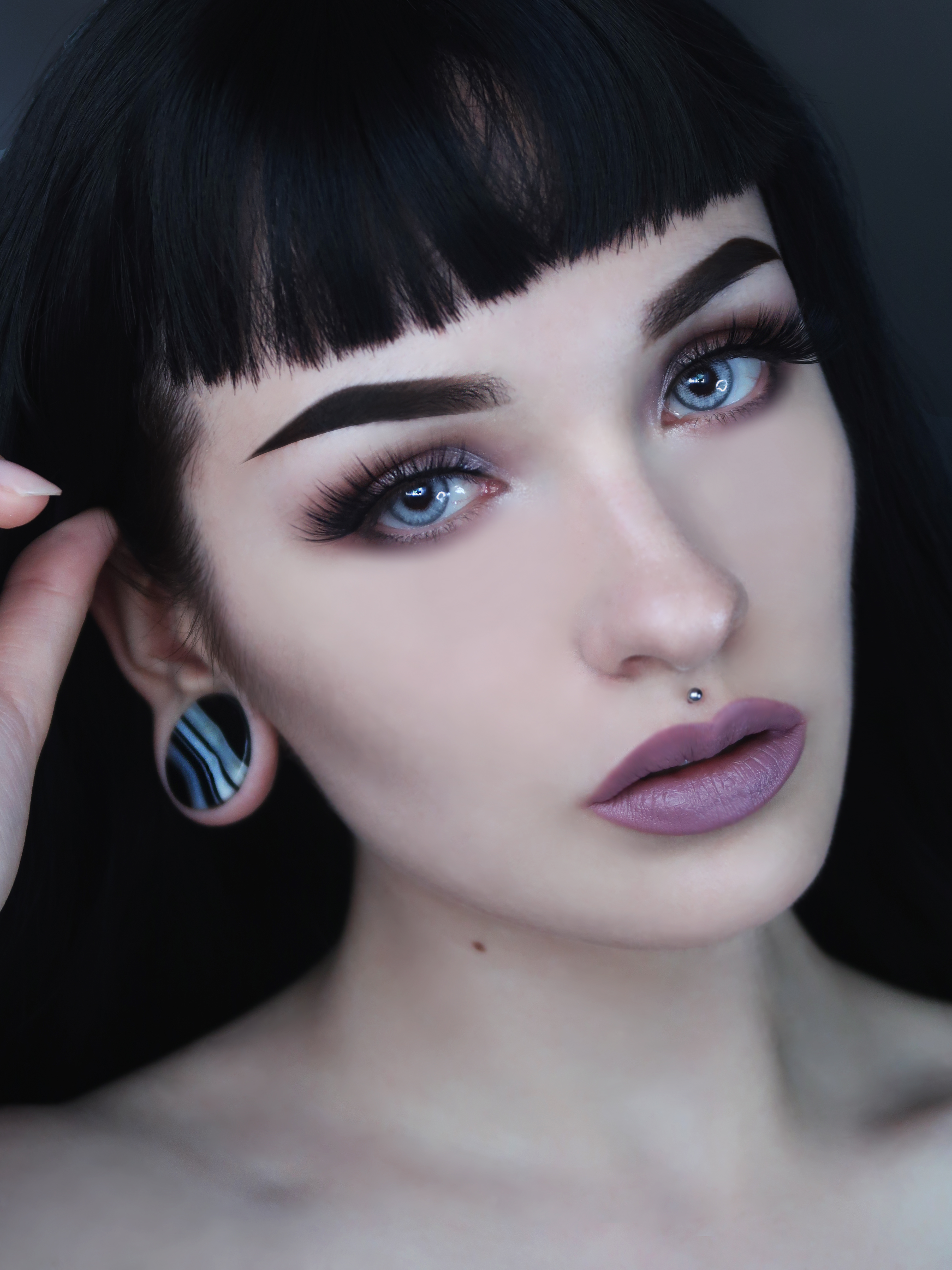 Women wearing large Black Line Agate Stone Plug / Gauge