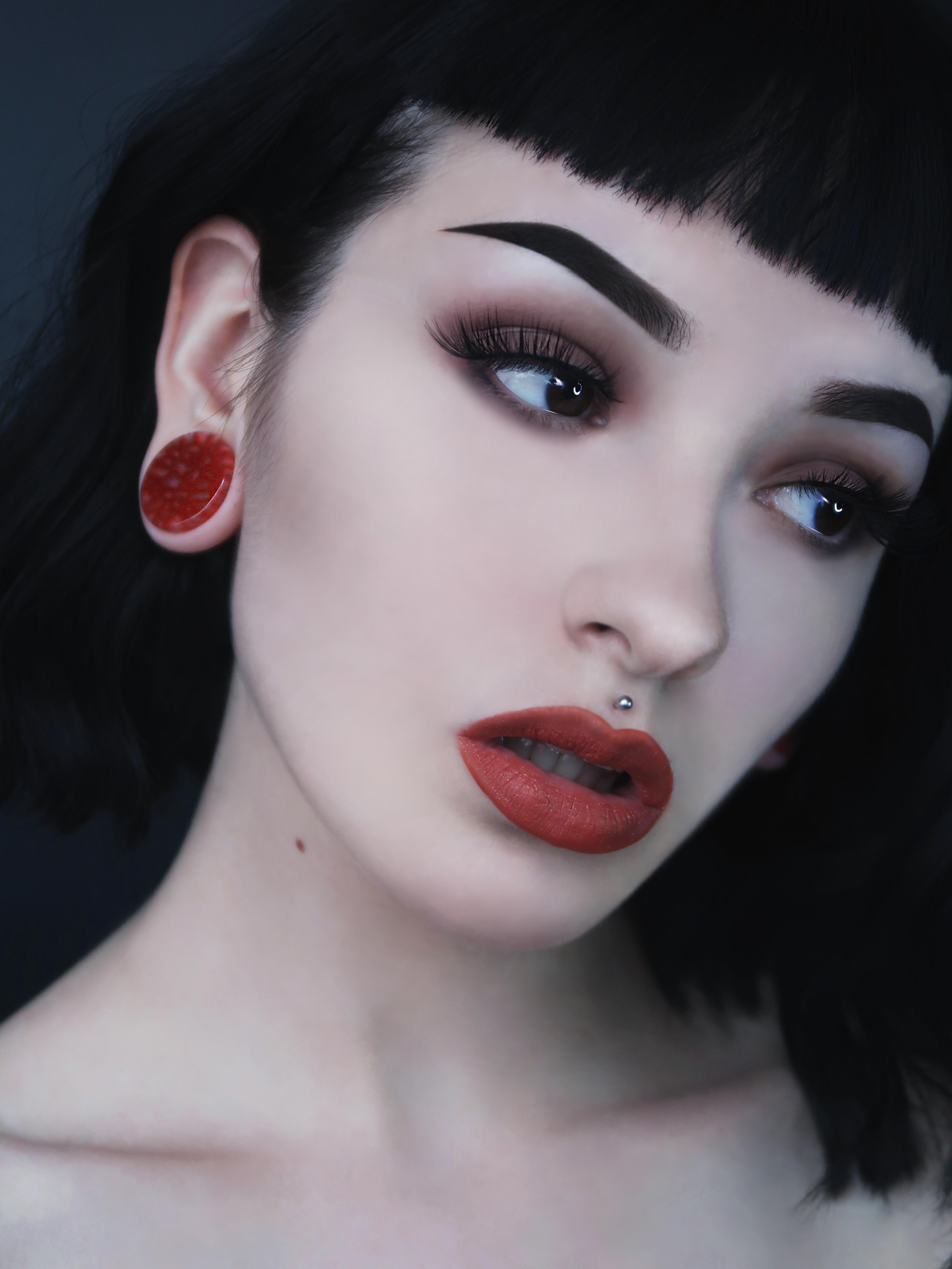 Female wearing cool Red Dragon Vein Agate Stone Plug / Gauge