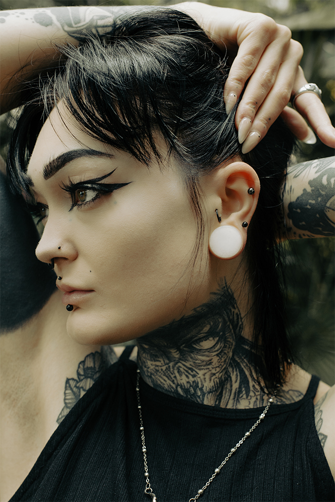 Girl wearing pretty  White Jade Stone Plug / Gauge