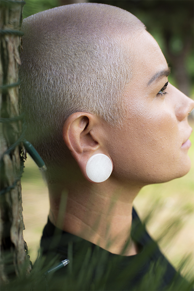 Girl wearing big  White Jade Stone Plug / Gauge