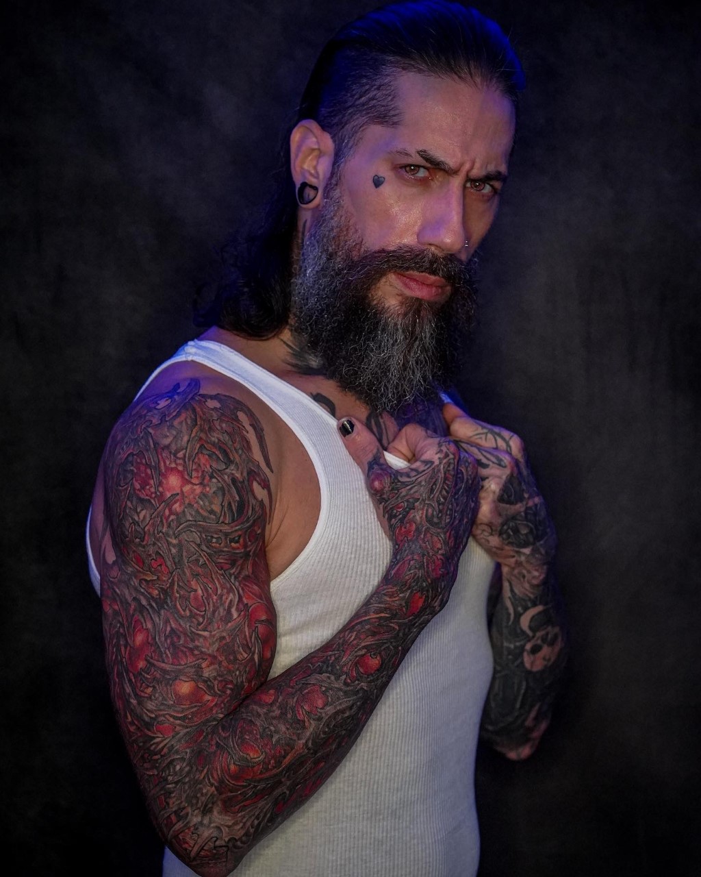 Guy wearing cool Heart Shaped Black Double Flared Stainless Steel Tunnel / Plug / Gauge