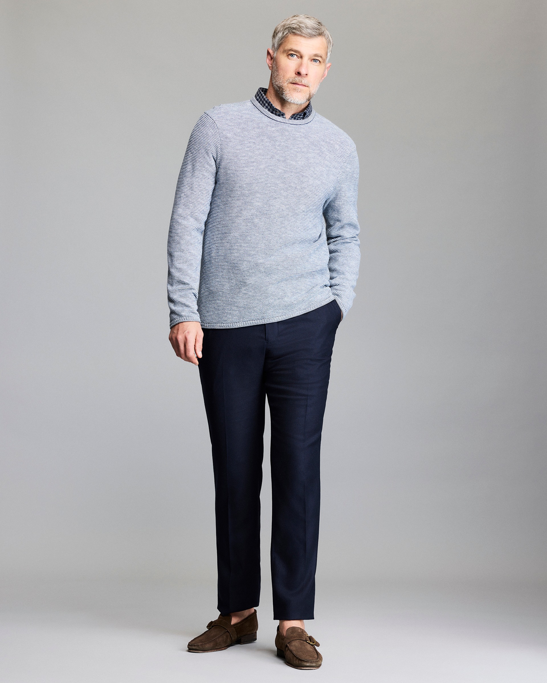 Model shows the fit of the sweater.