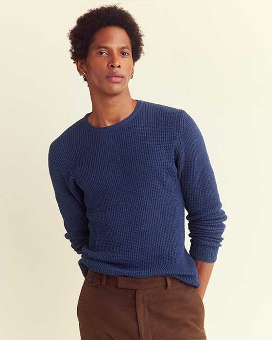 Male model wears the mini waffle crew.