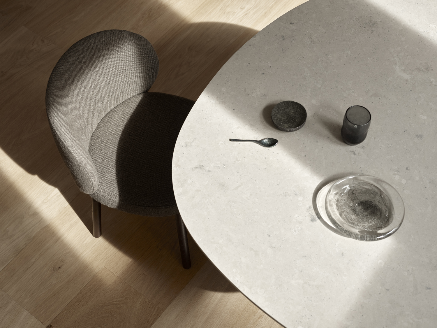 Ovata Dining Table - Jura Grey Limestone - Black Base - Floor Stock