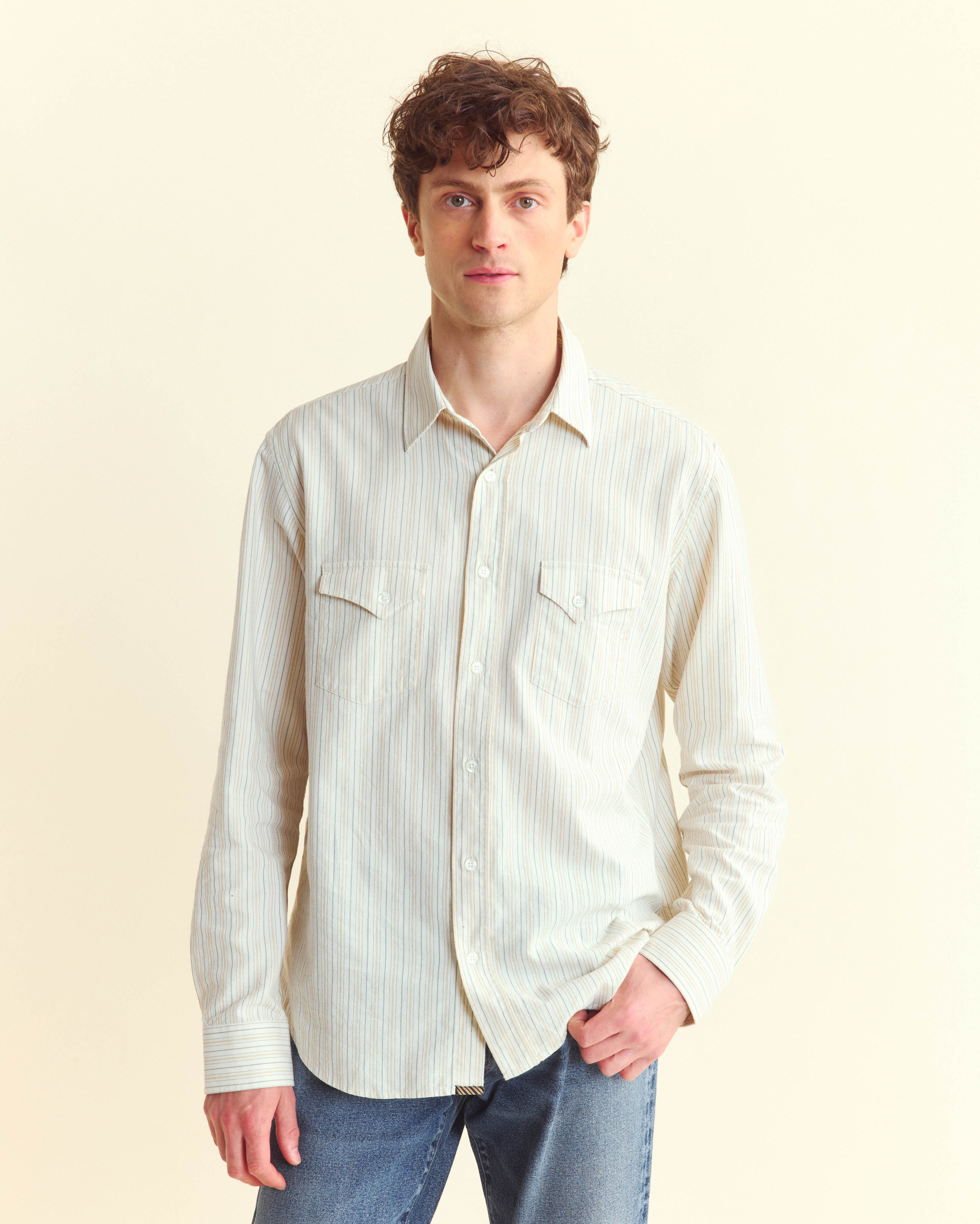 Male model wears Billy Reid shirt.