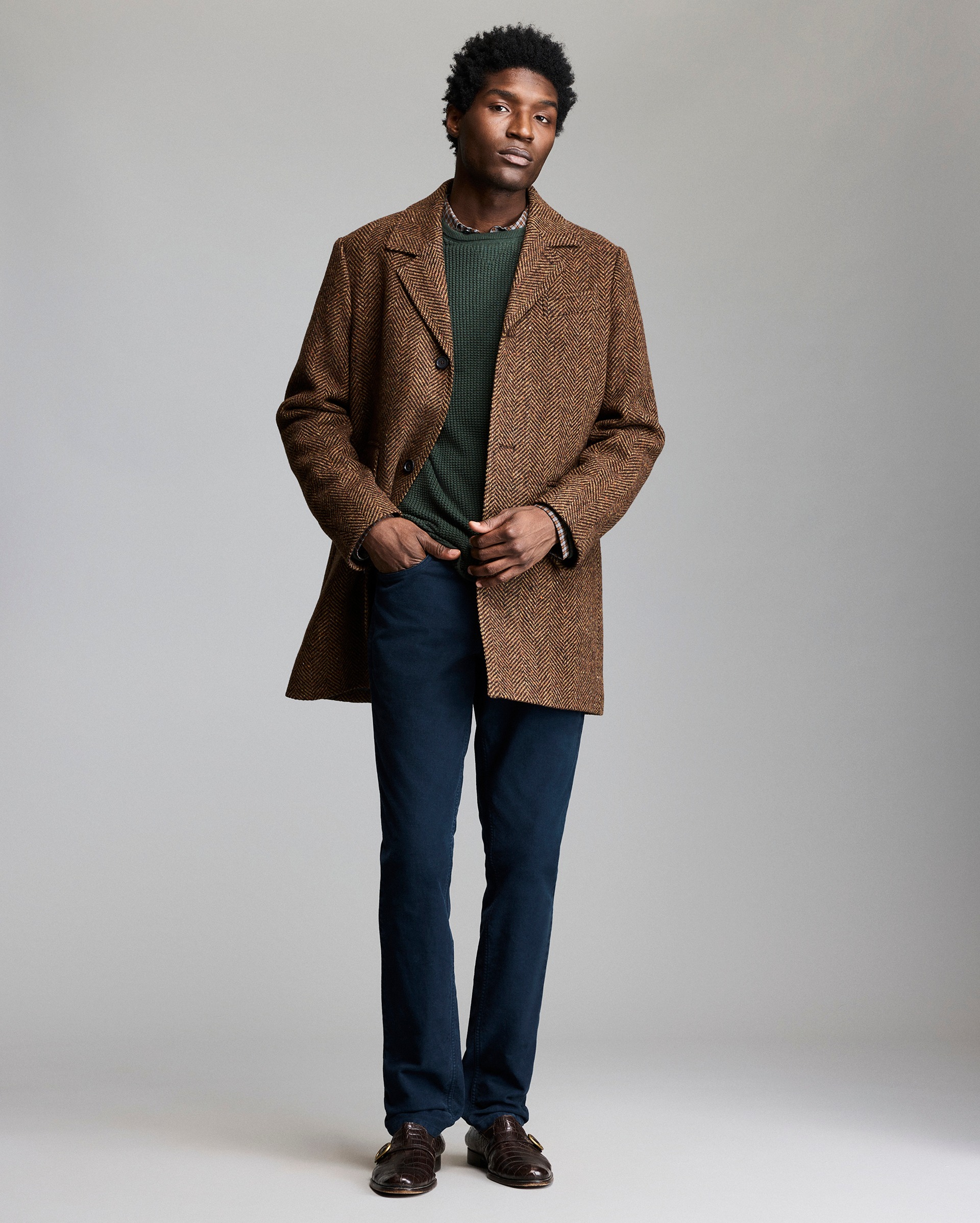 Model shows the fit of the coat
