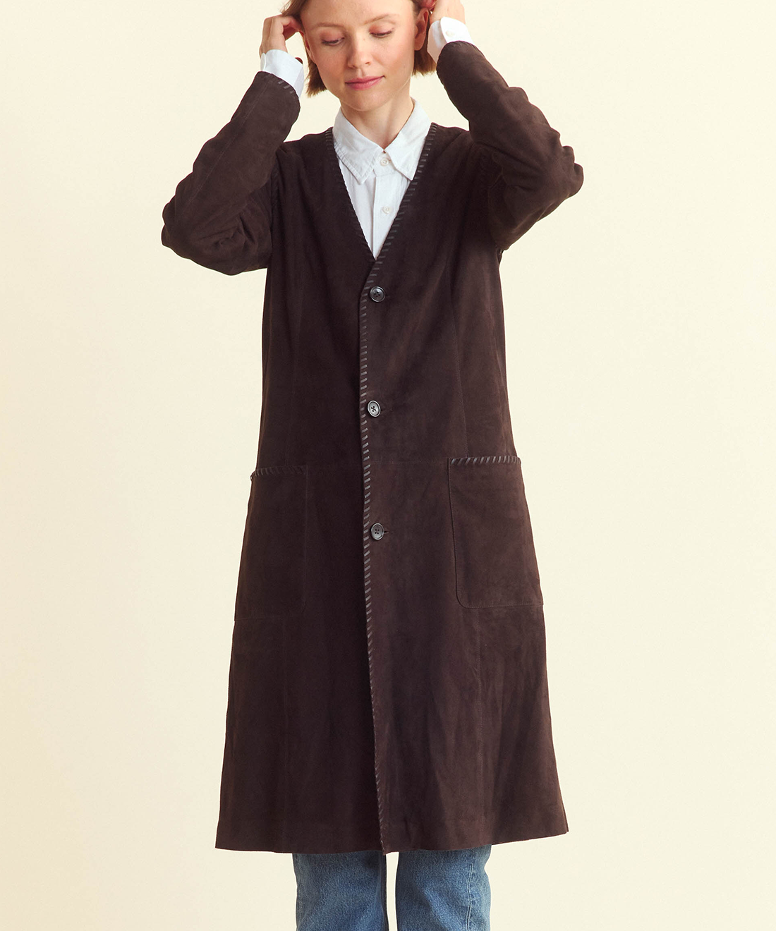 Model wears the Suede Whip Stitch Coat