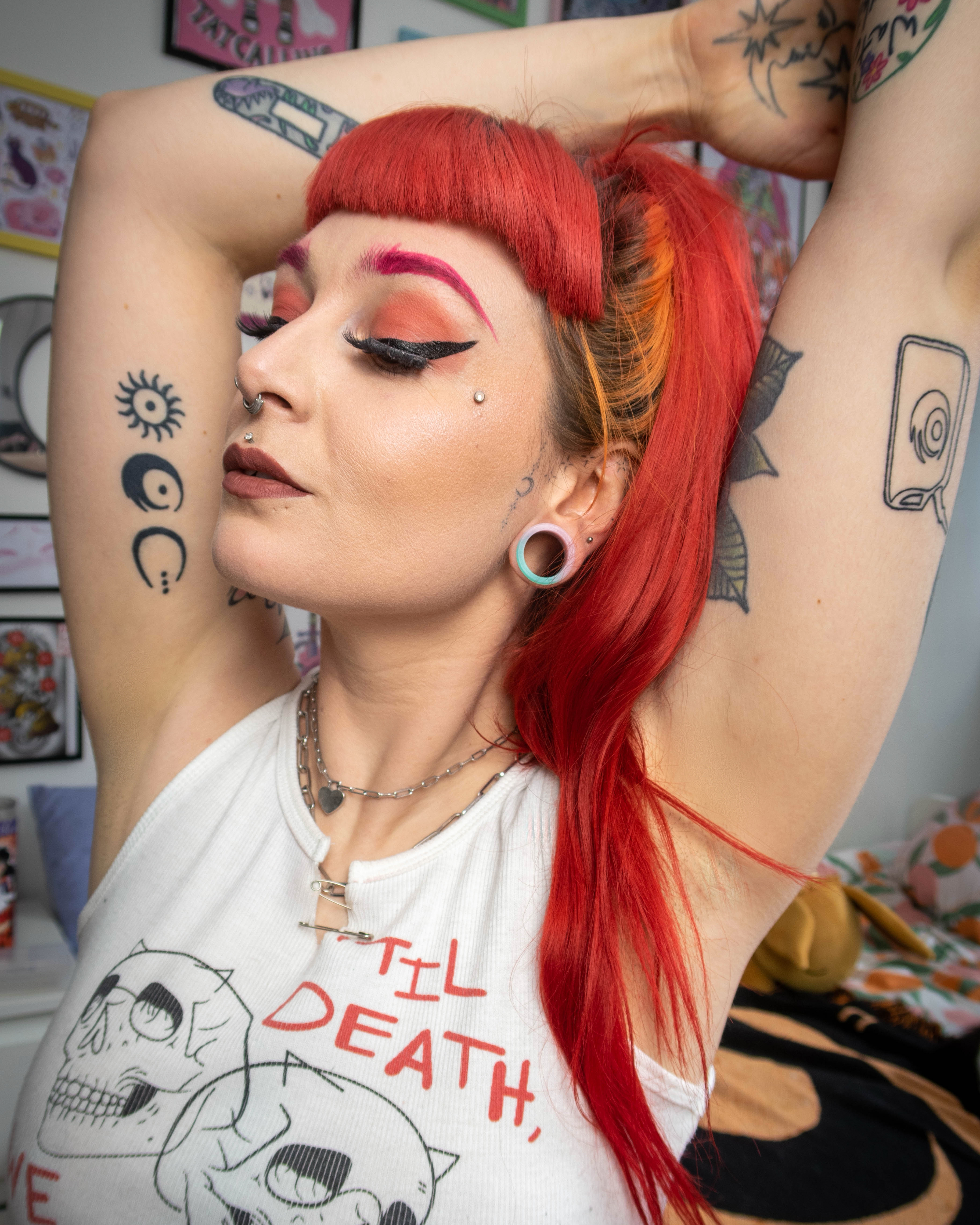Girl wearing alternative  Marble Light Green & Pink Silicone Ear Tunnel