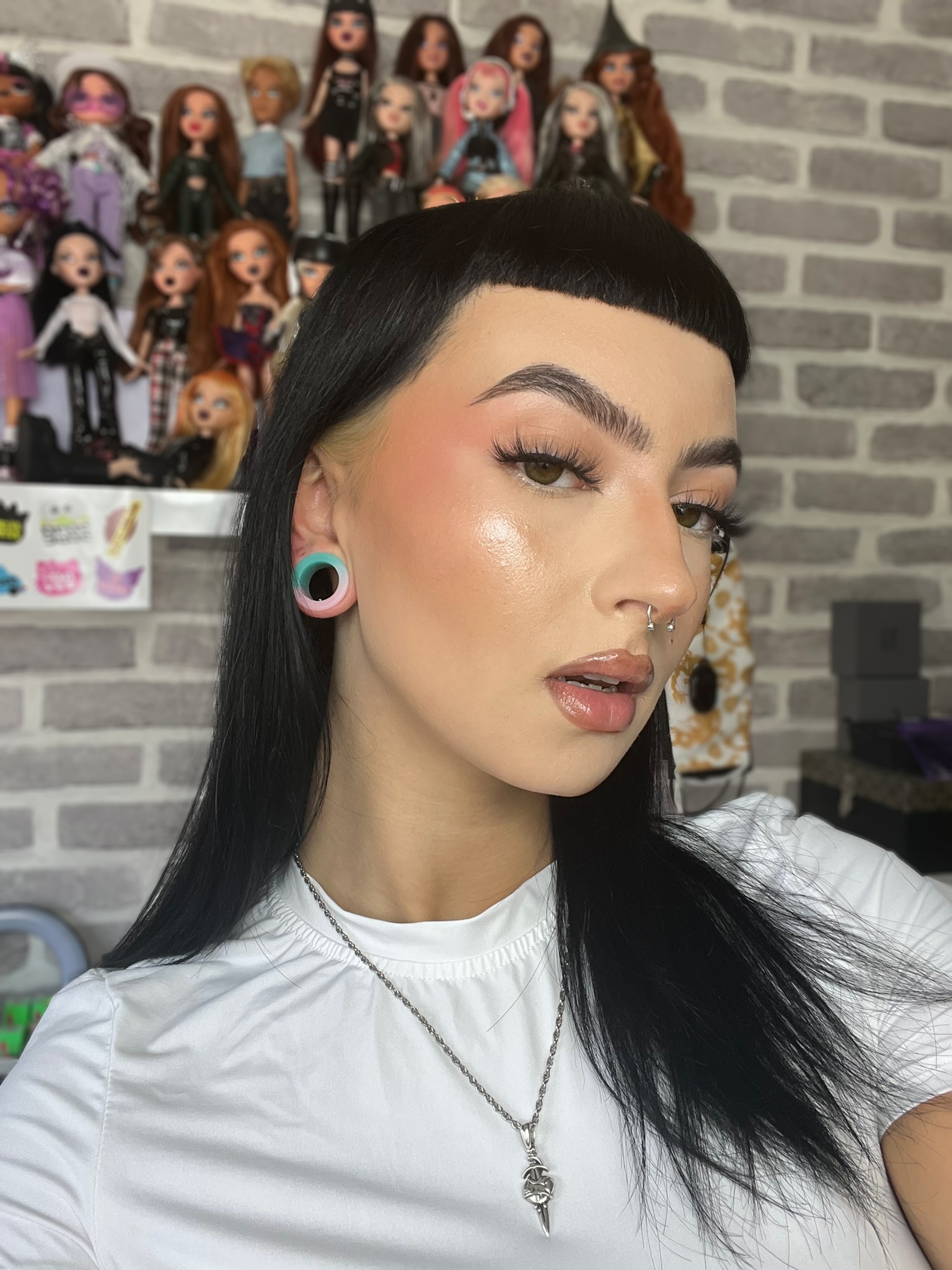 Girl wearing small  Marble Light Green & Pink Silicone Ear Tunnel