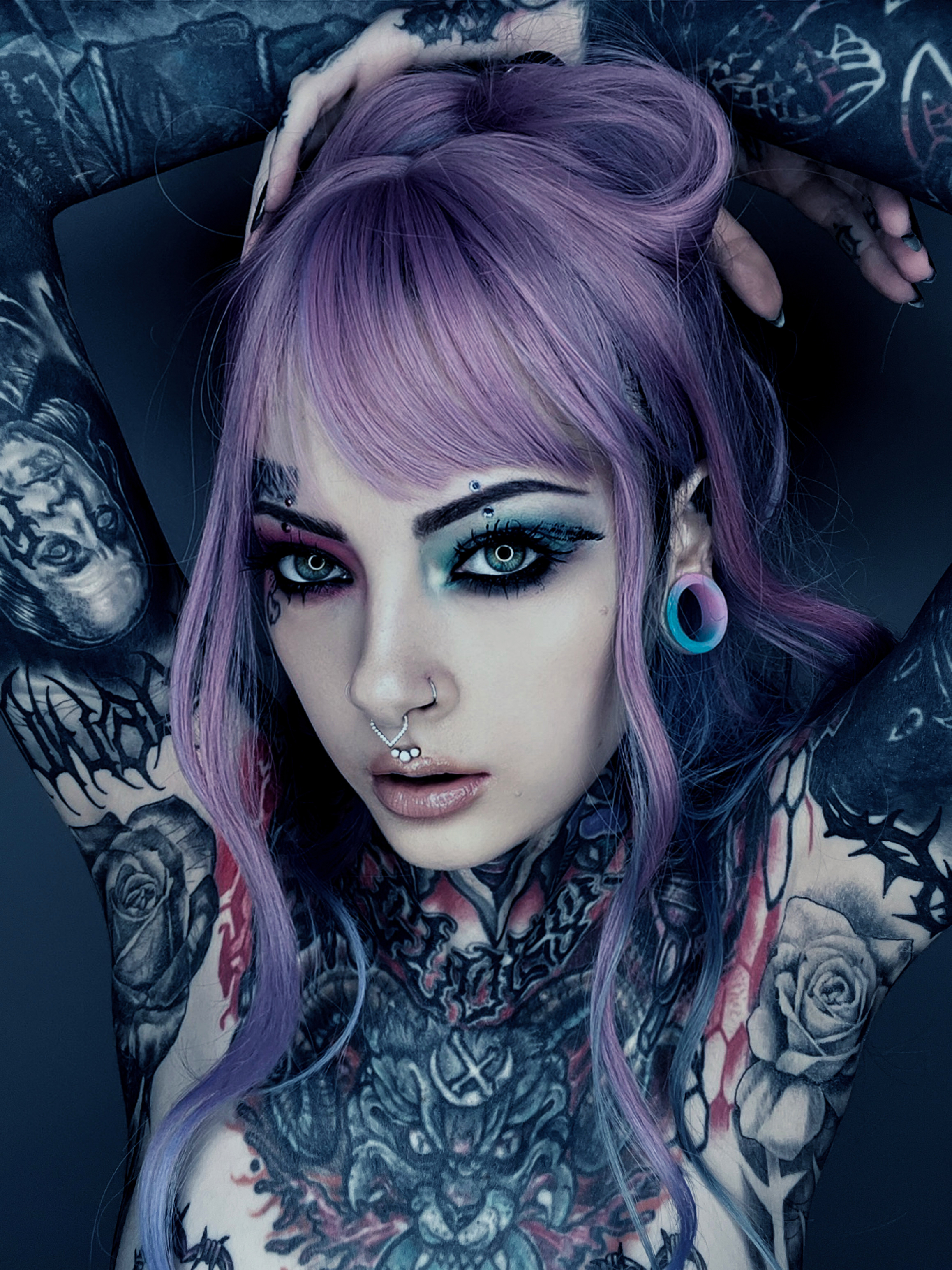Girl wearing cute Marble Light Green & Pink Silicone Ear Tunnel