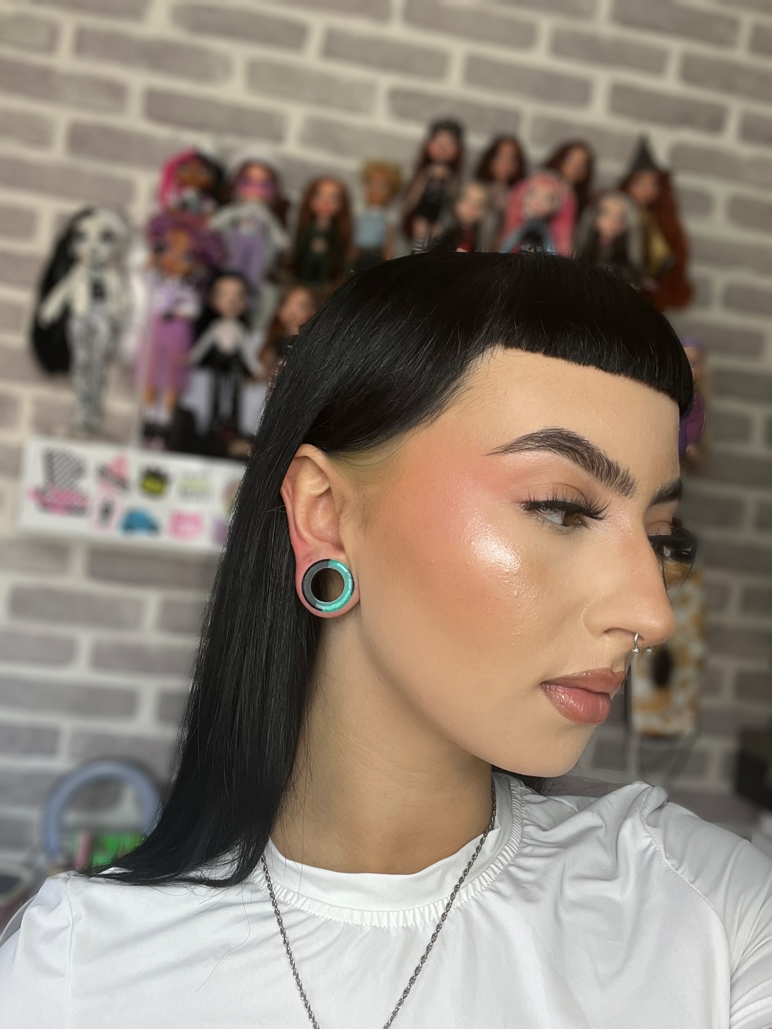 Girl wearing unique  Marble Green & Black Silicone Ear Tunnel