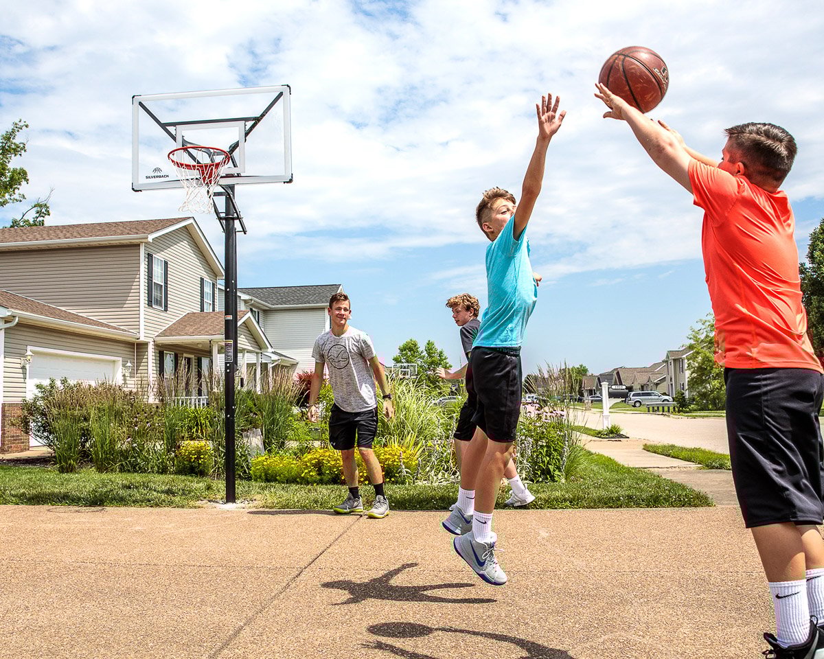in the ground basketball goal in driveway