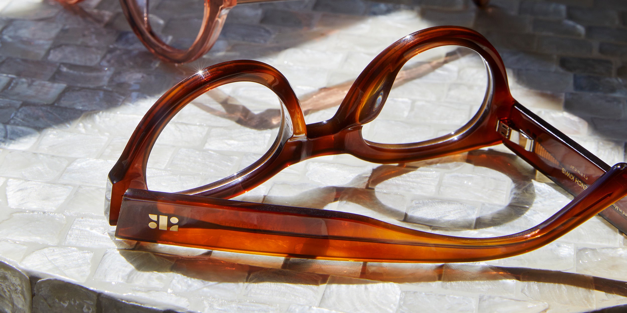 Photo Details of Florence Blue Light Brown Blue Light Glasses in a room